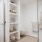 Penthouse bath with walk-in shower, additional built-in storage, deep soaking tub and floating double vanity with backlit mirror