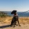 Dog on a leash near the water