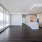 Penthouse dining room with floor to ceiling windows and wraparound terrace