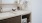 bathroom with quartz countertop and additional vanity storage